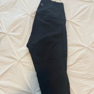 Black Lululemon crop with mesh along sides size 2